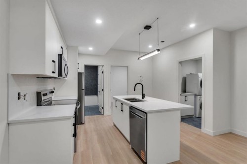 506 28 Avenue Nw, Calgary, AB - Indoor Photo Showing Kitchen With Double Sink With Upgraded Kitchen