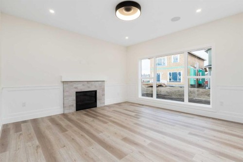 704 Mandalay Boulevard, Carstairs, AB - Indoor With Fireplace