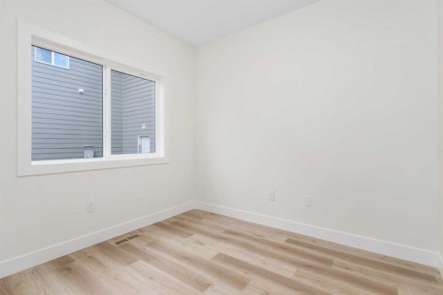 704 Mandalay Boulevard, Carstairs, AB - Indoor Photo Showing Other Room