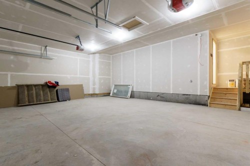 704 Mandalay Boulevard, Carstairs, AB - Indoor Photo Showing Garage