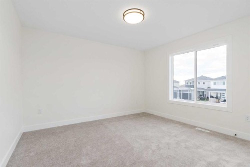 704 Mandalay Boulevard, Carstairs, AB - Indoor Photo Showing Other Room