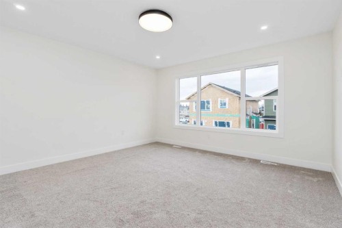 704 Mandalay Boulevard, Carstairs, AB - Indoor Photo Showing Other Room