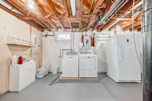 727 Macleay Road Ne, Calgary, AB - Indoor Photo Showing Laundry Room