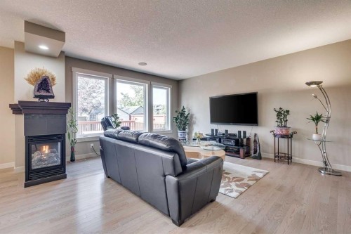 95 Evansdale Common Nw, Calgary, AB - Indoor Photo Showing Living Room With Fireplace
