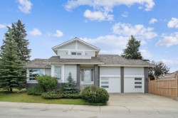 79 Woodbrook Road SW Calgary, AB T2W 4M5