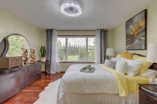 142 Discovery Ridge Boulevard Sw, Calgary, AB - Indoor Photo Showing Bedroom