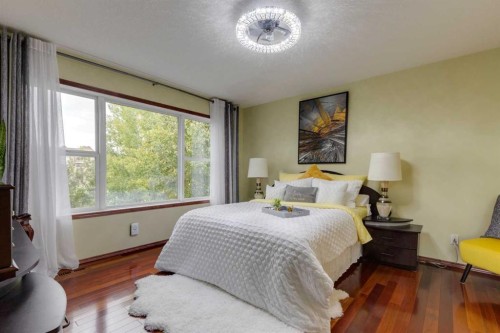 142 Discovery Ridge Boulevard Sw, Calgary, AB - Indoor Photo Showing Bedroom