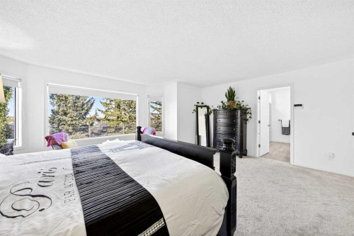 1360 Shawnee Road Sw, Calgary, AB - Indoor Photo Showing Bedroom