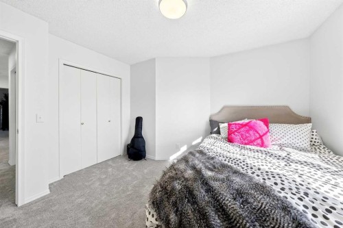 1360 Shawnee Road Sw, Calgary, AB - Indoor Photo Showing Bedroom