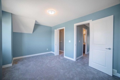 1218-121 Copperpond Common Se, Calgary, AB - Indoor Photo Showing Other Room