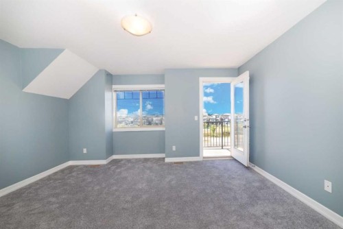 1218-121 Copperpond Common Se, Calgary, AB - Indoor Photo Showing Other Room