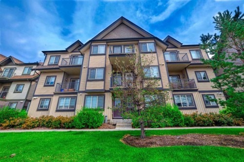 1218-121 Copperpond Common Se, Calgary, AB - Outdoor With Balcony With Facade