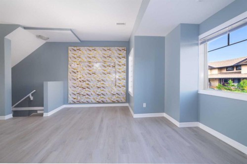 1218-121 Copperpond Common Se, Calgary, AB - Indoor Photo Showing Other Room