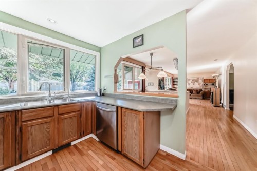 2443 Fir Drive Se, Calgary, AB - Indoor Photo Showing Kitchen With Double Sink