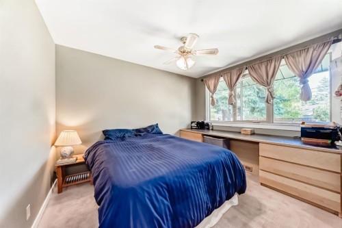 2443 Fir Drive Se, Calgary, AB - Indoor Photo Showing Bedroom