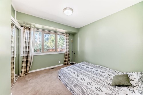 2443 Fir Drive Se, Calgary, AB - Indoor Photo Showing Bedroom
