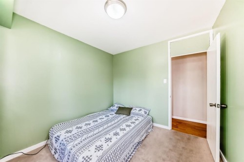 2443 Fir Drive Se, Calgary, AB - Indoor Photo Showing Bedroom