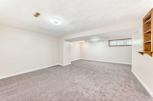 2443 Fir Drive Se, Calgary, AB - Indoor Photo Showing Other Room
