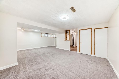 2443 Fir Drive Se, Calgary, AB - Indoor Photo Showing Other Room
