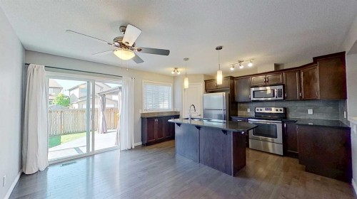 63 Elgin Meadows Park Se, Calgary, AB - Indoor Photo Showing Kitchen With Stainless Steel Kitchen