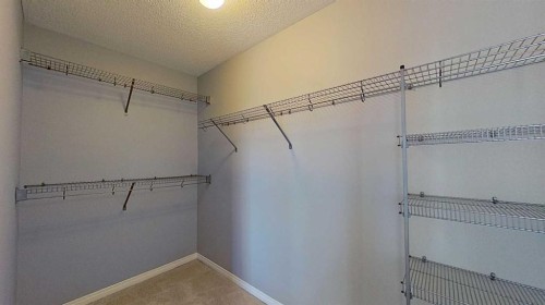 63 Elgin Meadows Park Se, Calgary, AB - Indoor With Storage