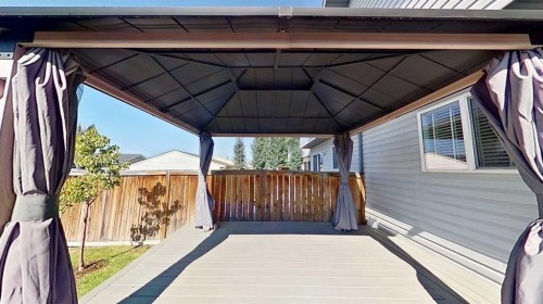 63 Elgin Meadows Park Se, Calgary, AB - Outdoor With Deck Patio Veranda With Exterior