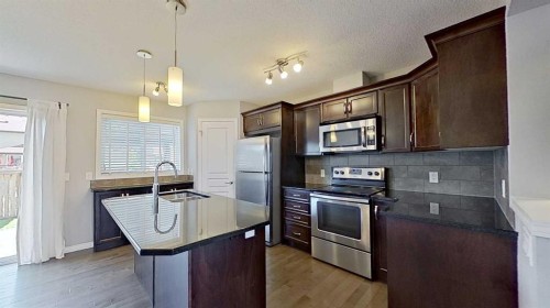 63 Elgin Meadows Park Se, Calgary, AB - Indoor Photo Showing Kitchen With Stainless Steel Kitchen With Upgraded Kitchen