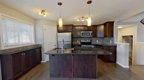 63 Elgin Meadows Park Se, Calgary, AB - Indoor Photo Showing Kitchen With Stainless Steel Kitchen