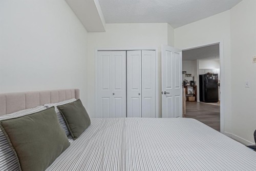 1217-1140 Taradale Drive Ne, Calgary, AB - Indoor Photo Showing Bedroom