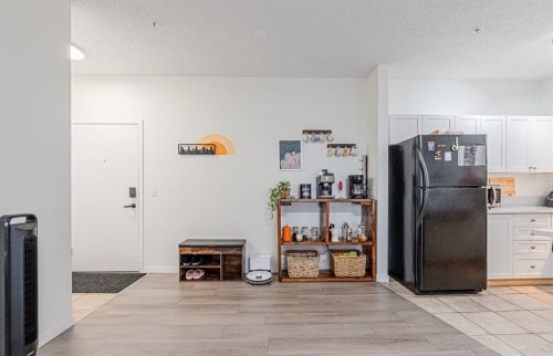 1217-1140 Taradale Drive Ne, Calgary, AB - Indoor Photo Showing Other Room
