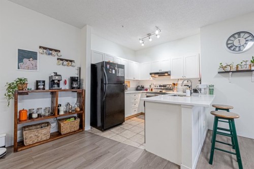 1217-1140 Taradale Drive Ne, Calgary, AB - Indoor Photo Showing Kitchen