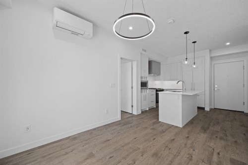 204-8370 Broadcast Avenue Sw, Calgary, AB - Indoor Photo Showing Kitchen