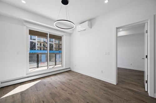 204-8370 Broadcast Avenue Sw, Calgary, AB - Indoor Photo Showing Other Room