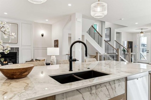 211 Calais Drive Sw, Calgary, AB - Indoor Photo Showing Kitchen With Double Sink With Upgraded Kitchen