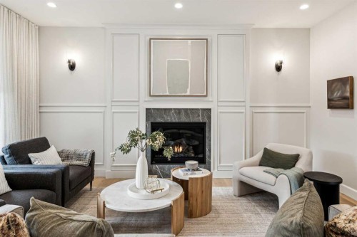 211 Calais Drive Sw, Calgary, AB - Indoor Photo Showing Living Room With Fireplace