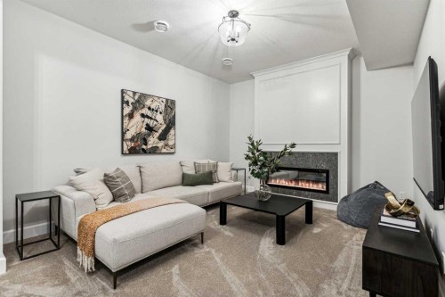 211 Calais Drive Sw, Calgary, AB - Indoor Photo Showing Living Room With Fireplace