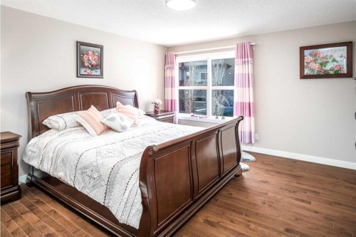 767 Shawnee Drive Sw, Calgary, AB - Indoor Photo Showing Bedroom