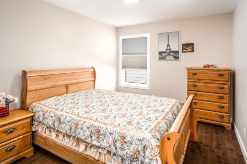 767 Shawnee Drive Sw, Calgary, AB - Indoor Photo Showing Bedroom