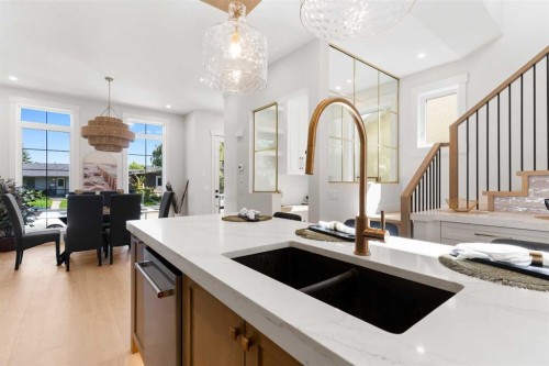 1425 44 Street Sw, Calgary, AB - Indoor Photo Showing Kitchen With Double Sink