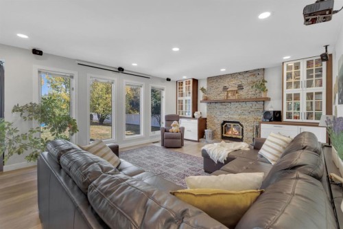 6018 58 Street, Olds, AB - Indoor Photo Showing Living Room With Fireplace
