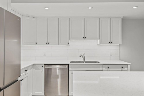 115 Spray Avenue, Banff, AB - Indoor Photo Showing Kitchen With Double Sink