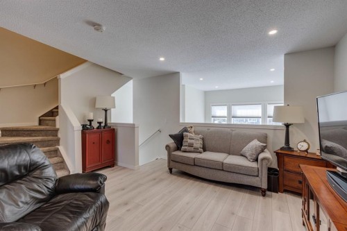 174 Chinook Gate Boulevard Sw, Airdrie, AB - Indoor Photo Showing Living Room