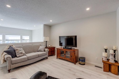 174 Chinook Gate Boulevard Sw, Airdrie, AB - Indoor Photo Showing Living Room