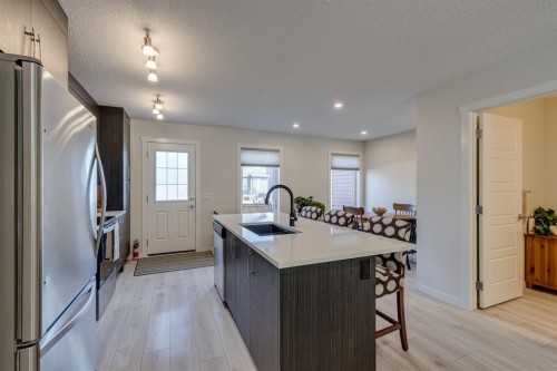 174 Chinook Gate Boulevard Sw, Airdrie, AB - Indoor Photo Showing Kitchen With Upgraded Kitchen