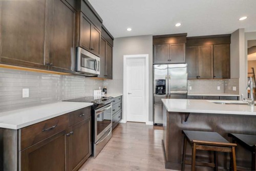 9 Walden Park Se, Calgary, AB - Indoor Photo Showing Kitchen With Stainless Steel Kitchen With Upgraded Kitchen