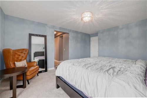 9 Walden Park Se, Calgary, AB - Indoor Photo Showing Bedroom