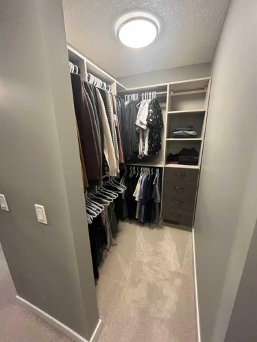 9 Walden Park Se, Calgary, AB - Indoor With Storage