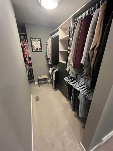9 Walden Park Se, Calgary, AB - Indoor With Storage
