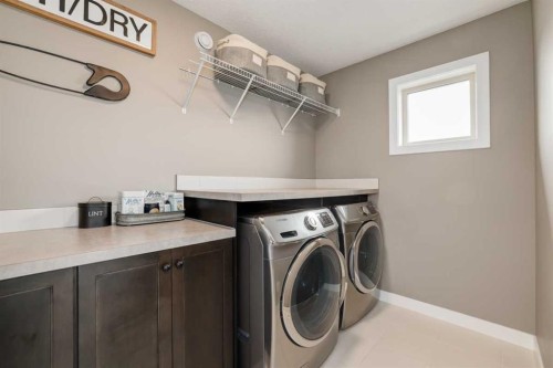 9 Walden Park Se, Calgary, AB - Indoor Photo Showing Laundry Room