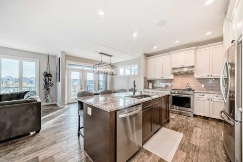 95 Marquis Crescent Se, Calgary, AB - Indoor Photo Showing Kitchen With Stainless Steel Kitchen With Double Sink With Upgraded Kitchen